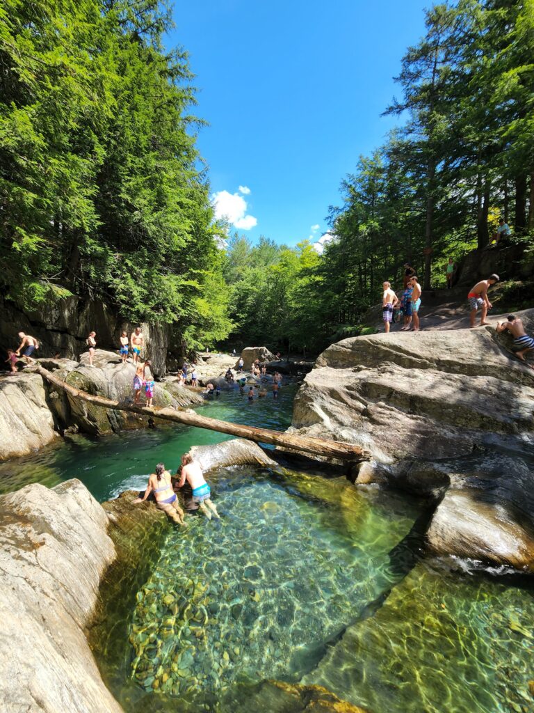 People soaking up the summer vibes at Warren Falls