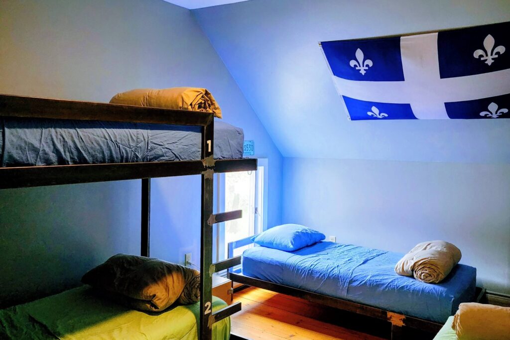 This is a picture of the Quebec Room, a shared space that accommodates four people.